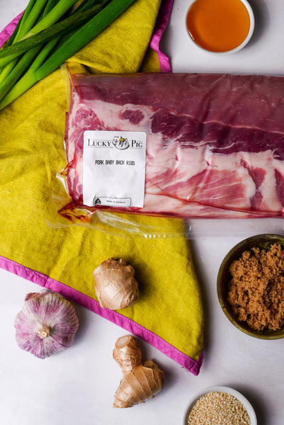 Baby back pork ribs and ingredients for The Lucky Pig’s Sticky Asian BBQ Pork Ribs recipe