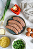 Leaning Tower sausages with ingredients for sausage breakfast muffins; serving suggestion