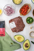 The Lucky Pig 500 g premium beef mince pack with avocado, tomato, cheese and nacho ingredients